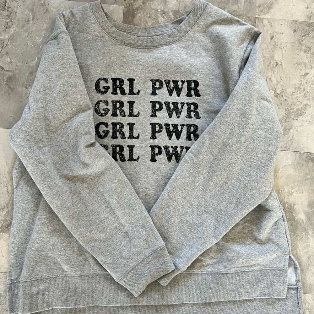 Crewneck pullover is over sized worn only a couple times.